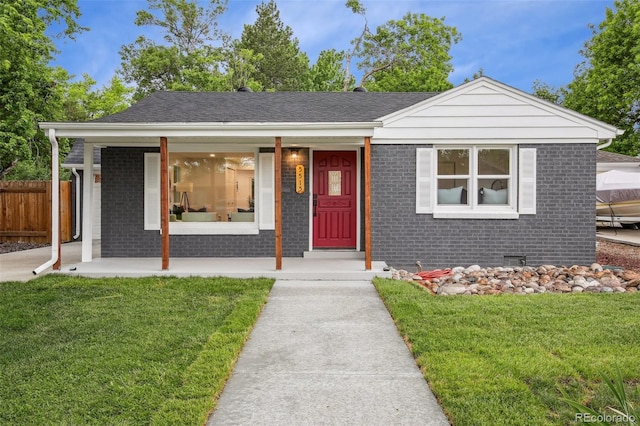 5515 Dudley Ct, Arvada, CO 80002 - ranch-style home with brick siding and covered porch
