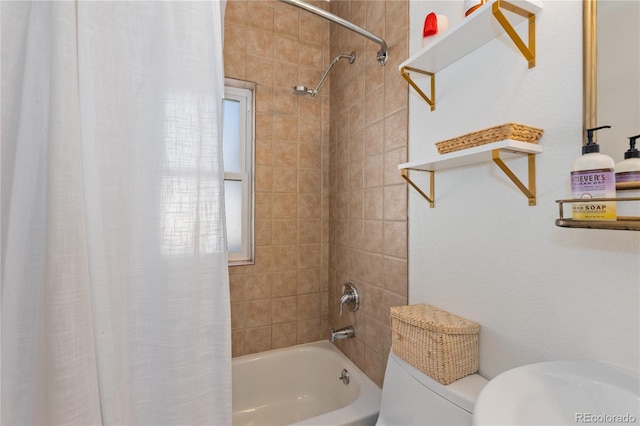 bathroom with shower / bathtub combination with curtain and toilet