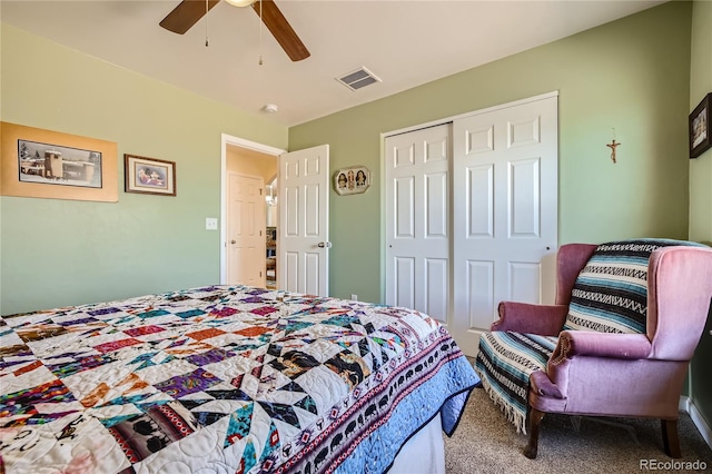 bedroom featuring carpet, ceiling fan, and a closet