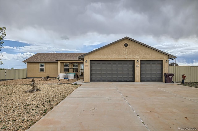 single story home with a garage