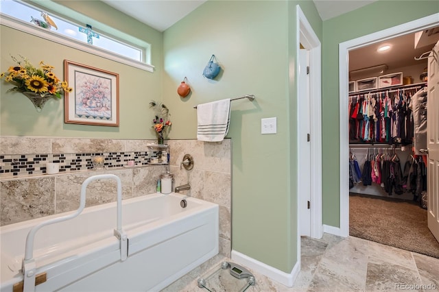 bathroom featuring a washtub