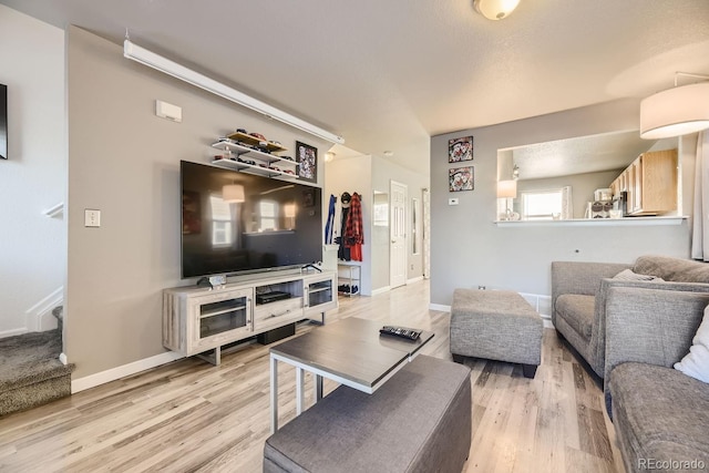 living room with light hardwood / wood-style floors