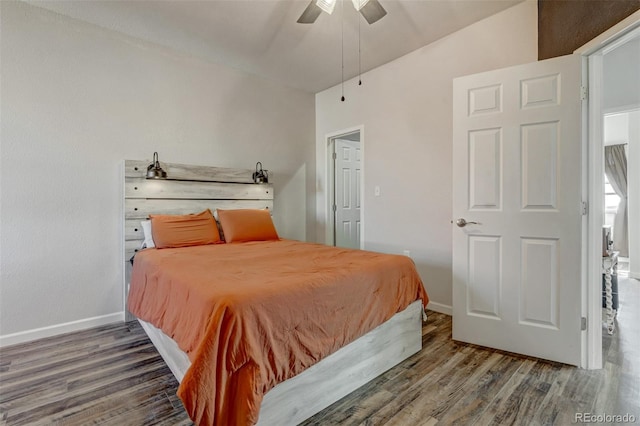 bedroom featuring ceiling fan, lofted ceiling, and dark hardwood / wood-style floors