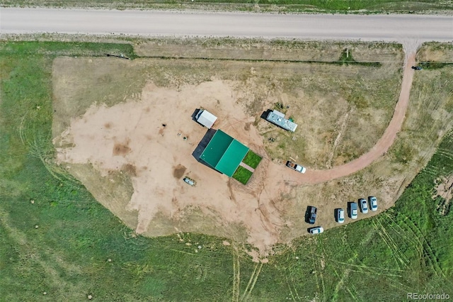 birds eye view of property featuring a rural view