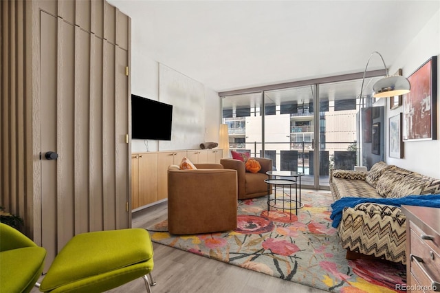 790 N Washington St Unit 407, Denver, CO 80203 - living area with wood finished floors