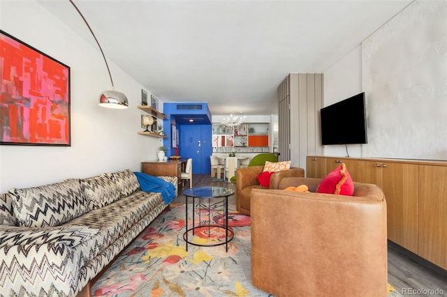 790 N Washington St Unit 407, Denver, CO 80203 - living room featuring a chandelier and wood finished floors