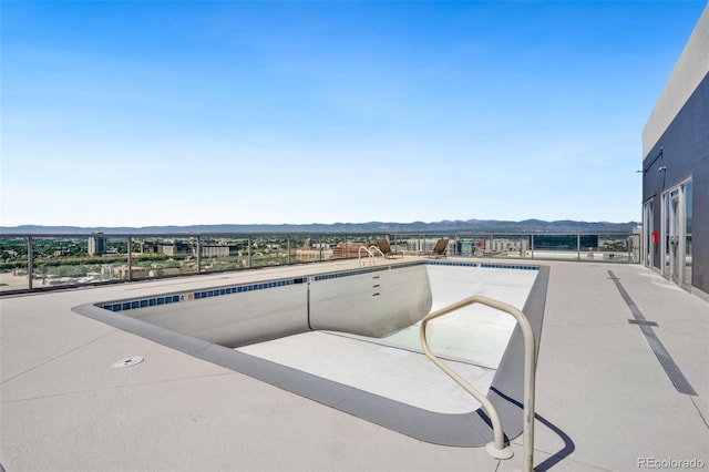 790 N Washington St Unit 407, Denver, CO 80203 - community pool featuring a mountain view