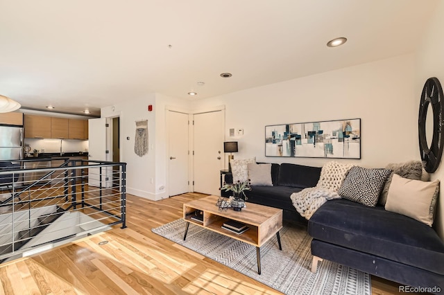 2837 Vallejo St Unit 102, Denver, CO 80211 - living area with light wood finished floors and recessed lighting