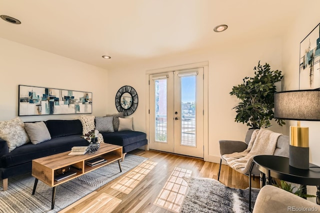 2837 Vallejo St Unit 102, Denver, CO 80211 - living area with french doors, wood finished floors, and recessed lighting