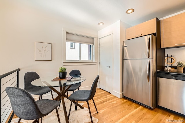 2837 Vallejo St Unit 102, Denver, CO 80211 - dining room with light wood-type flooring and recessed lighting