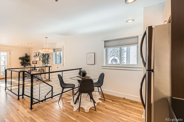 2837 Vallejo St Unit 102, Denver, CO 80211 - dining room with light wood-style floors and recessed lighting