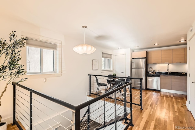 2837 Vallejo St Unit 102, Denver, CO 80211 - stairs with wood finished floors and recessed lighting