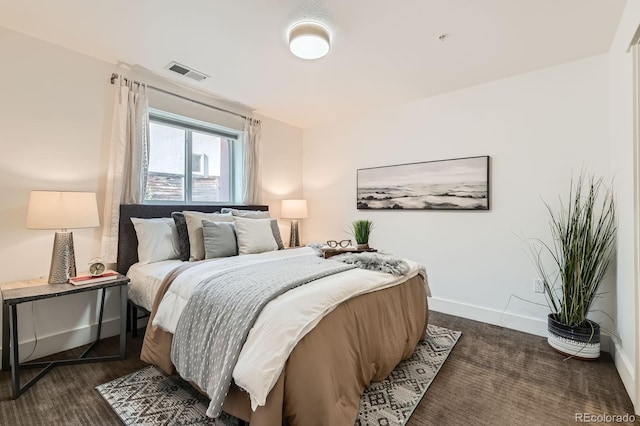 2837 Vallejo St Unit 102, Denver, CO 80211 - bedroom with baseboards and dark carpet