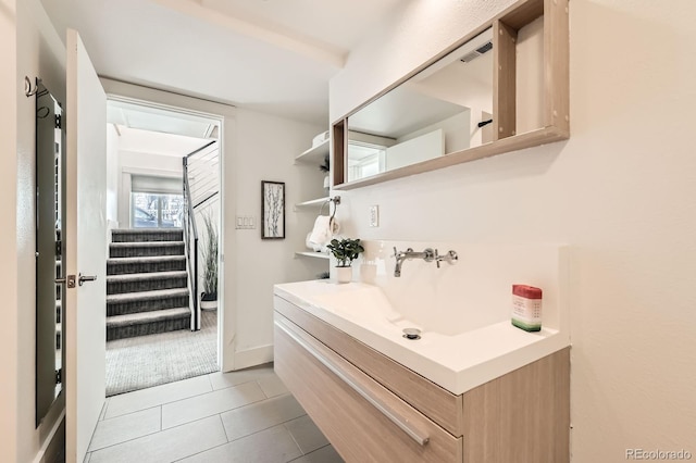 2837 Vallejo St Unit 102, Denver, CO 80211 - bathroom with vanity and tile patterned floors