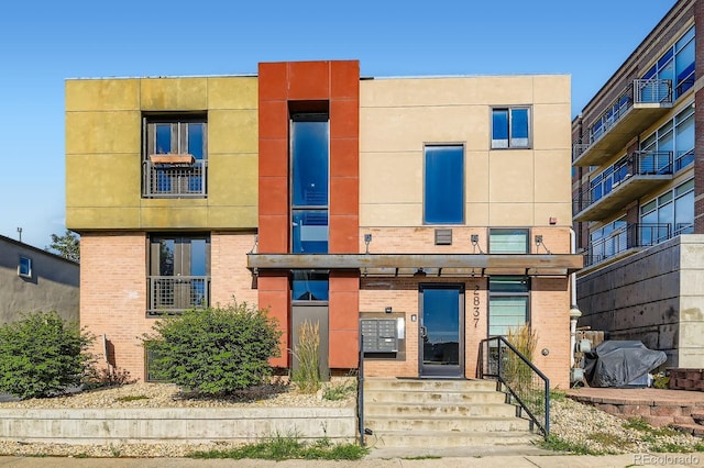 2837 Vallejo St Unit 102, Denver, CO 80211 - modern home featuring brick siding