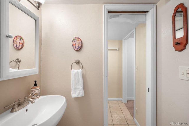 628 Cherry St, Denver, CO 80220 - bathroom featuring a sink and tile patterned floors