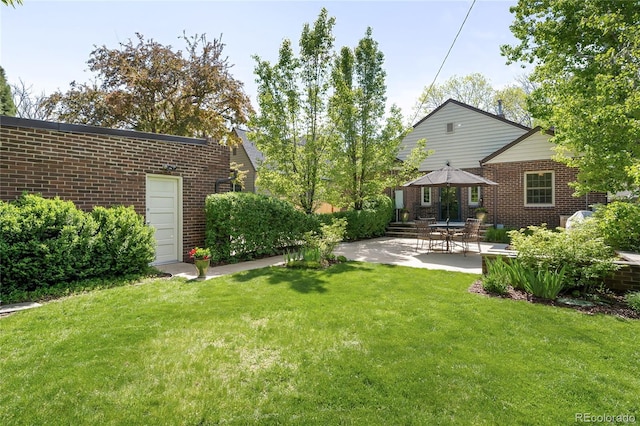 628 Cherry St, Denver, CO 80220 - view of green lawn featuring a patio area