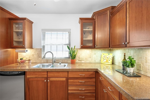628 Cherry St, Denver, CO 80220 - kitchen featuring stainless steel dishwasher, a sink, glass insert cabinets, and brown cabinets