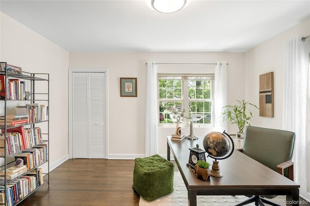 628 Cherry St, Denver, CO 80220 - home office with wood finished floors and baseboards
