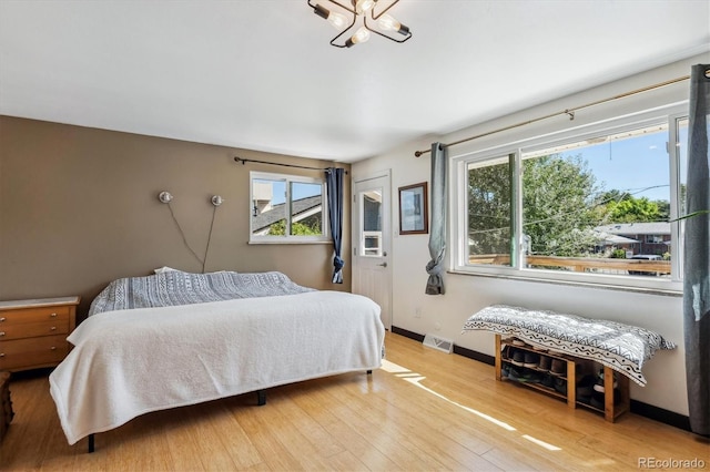 bedroom featuring light wood-type flooring