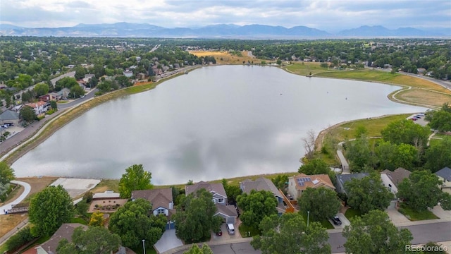 birds eye view of property featuring a residential view and a water and mountain view