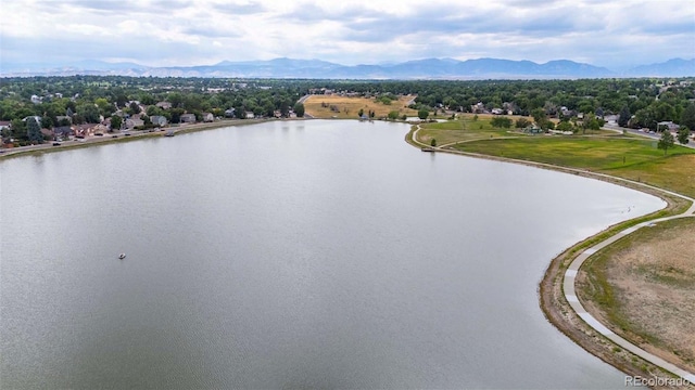 bird's eye view featuring a water and mountain view