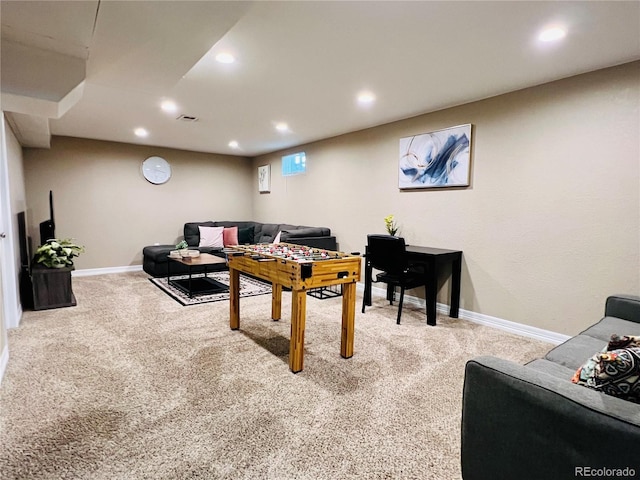 recreation room featuring carpet flooring