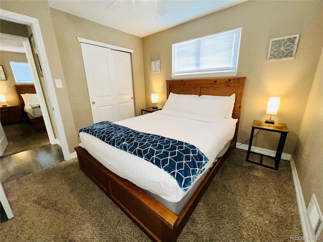 bedroom featuring a closet, ceiling fan, and dark colored carpet