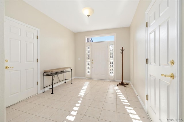 entrance foyer featuring light tile patterned floors