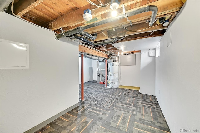 basement with carpet and water heater