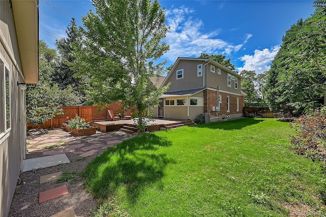 view of yard with a deck