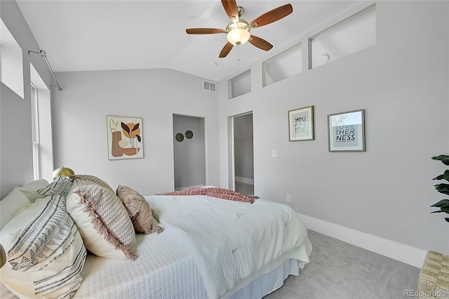 bedroom featuring ceiling fan, carpet, and lofted ceiling