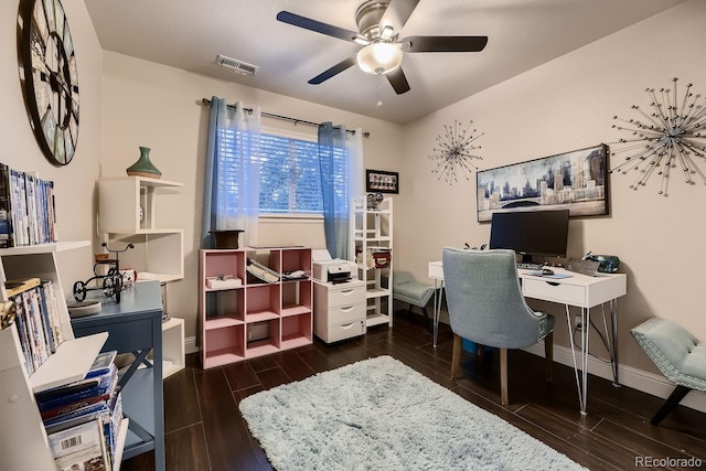 office space with dark hardwood / wood-style floors and ceiling fan