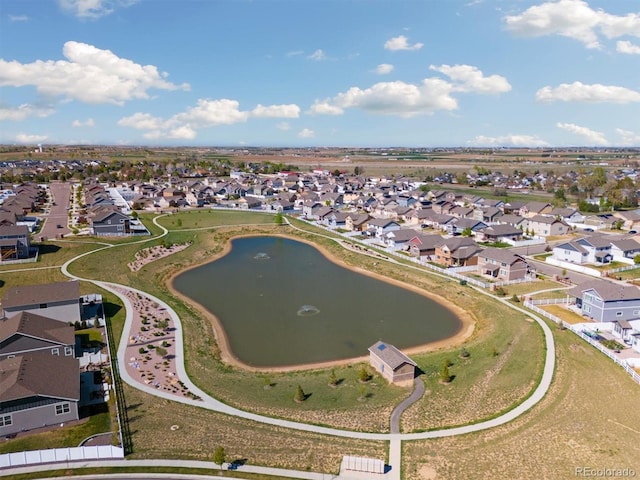 aerial view featuring a water view and a residential view