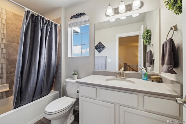 full bath featuring toilet, shower / tub combo with curtain, and vanity