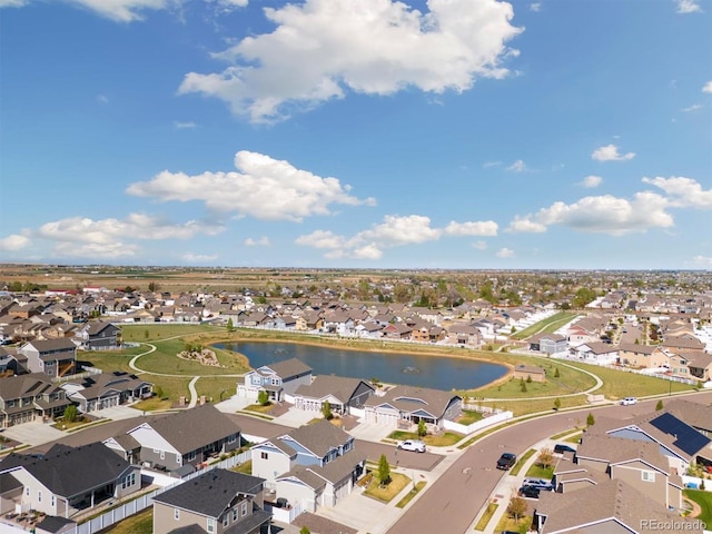 aerial view with a water view and a residential view