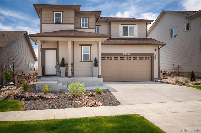 9389 Mayflower Gulch Way, Colorado Springs, CO 80927 - view of front of property featuring driveway, a garage, and a shingled roof