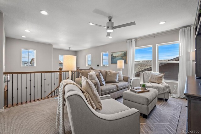 9389 Mayflower Gulch Way, Colorado Springs, CO 80927 - living room featuring a ceiling fan, recessed lighting, and carpet floors