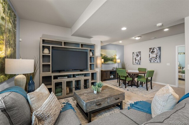 9389 Mayflower Gulch Way, Colorado Springs, CO 80927 - living room with baseboards and recessed lighting