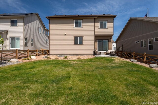 9389 Mayflower Gulch Way, Colorado Springs, CO 80927 - rear view of house with a patio