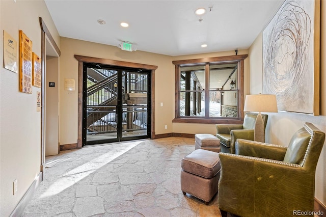 33 Broken Lance Dr Unit 207S, Breckenridge, CO 80424 - sitting room featuring plenty of natural light, stone finish floors, and recessed lighting