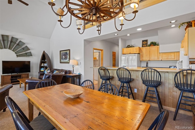 33 Broken Lance Dr Unit 207S, Breckenridge, CO 80424 - dining space with carpet flooring, recessed lighting, and high vaulted ceiling