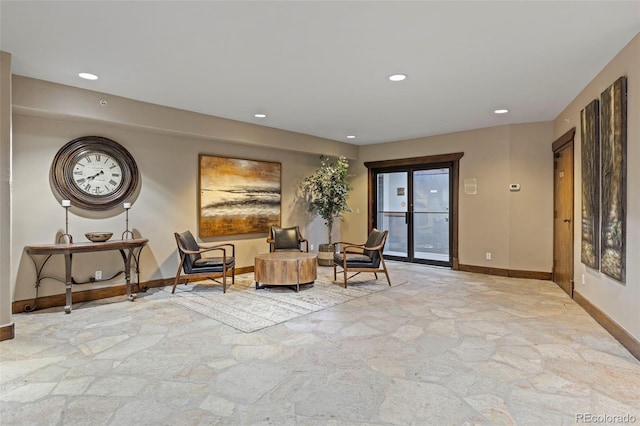 33 Broken Lance Dr Unit 207S, Breckenridge, CO 80424 - sitting room with stone flooring and recessed lighting