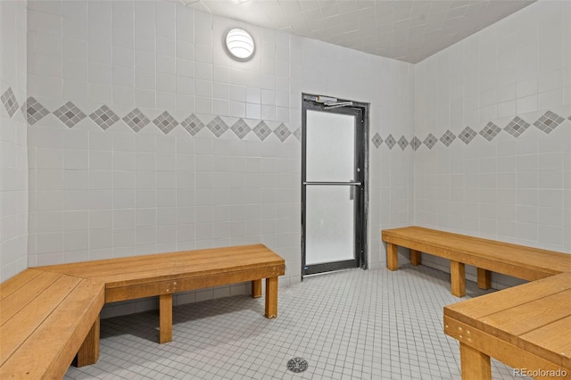 33 Broken Lance Dr Unit 207S, Breckenridge, CO 80424 - bathroom with tile walls and tile patterned floors