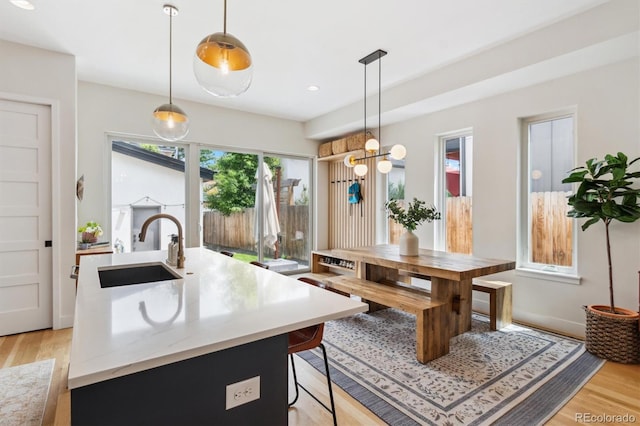2244 S Lincoln St, Denver, CO 80210 - dining area featuring light wood-type flooring, recessed lighting, and a chandelier