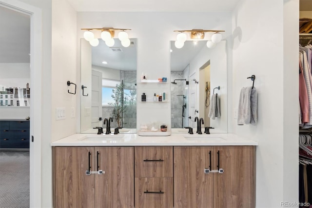 2244 S Lincoln St, Denver, CO 80210 - bathroom with a walk in closet, double vanity, and a shower stall