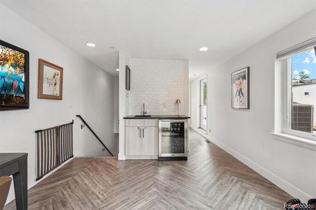 2244 S Lincoln St, Denver, CO 80210 - indoor wet bar featuring wine cooler, recessed lighting, and baseboards