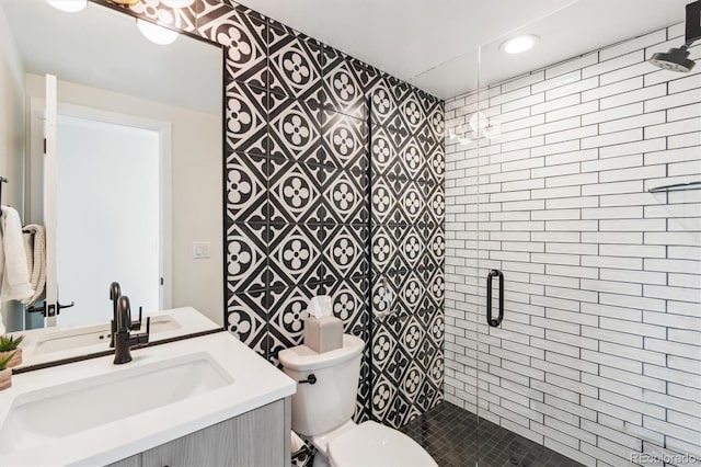 2244 S Lincoln St, Denver, CO 80210 - full bathroom featuring vanity, toilet, and a shower stall