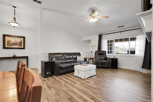 4251 S Blackhawk Cir Unit 3E, Aurora, CO 80014 - living room with ceiling fan and light wood finished floors