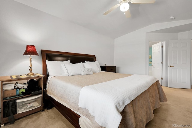 4251 S Blackhawk Cir Unit 3E, Aurora, CO 80014 - bedroom with light carpet, vaulted ceiling, and ceiling fan